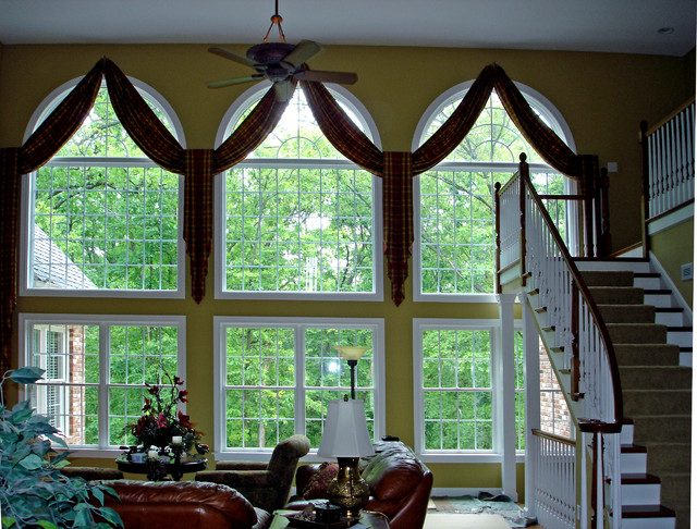  The best match for Baroque style is the arched windows with an abundance of different parts and the general trend in luxury design. They often get special decorative layouts (Georgian bars), creating the appearance of dividing the large window into small parts.